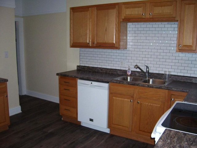 kitchen with dark wood-type flooring, range with electric cooktop, a sink, decorative backsplash, and dishwasher