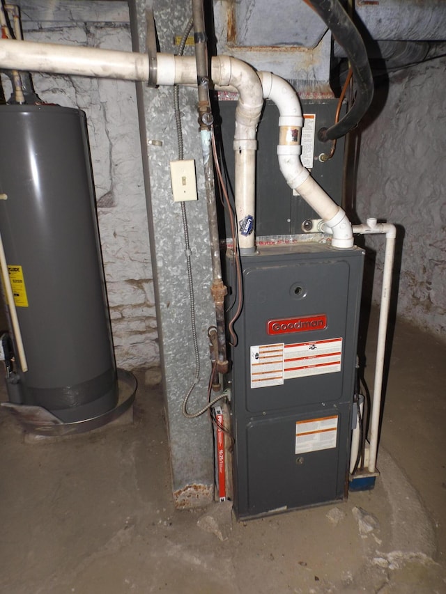 utility room with water heater