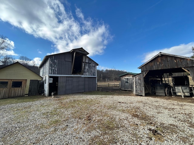 exterior space featuring an outbuilding