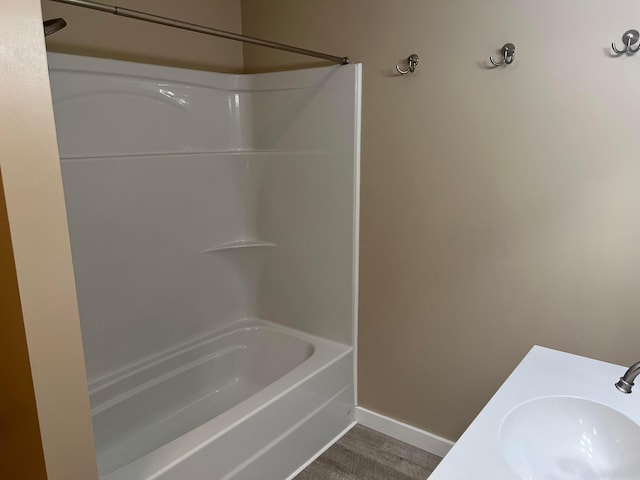 bathroom with sink and shower / bathing tub combination