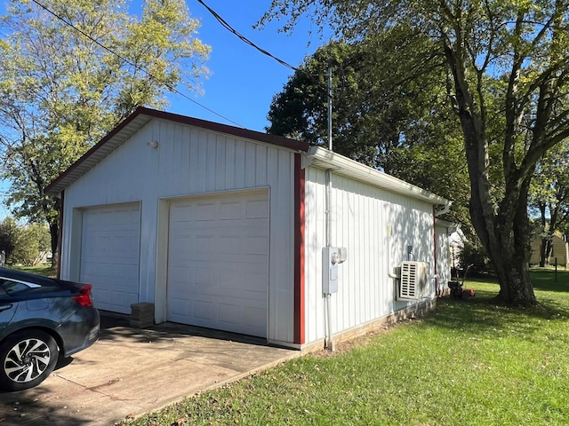 garage with a lawn