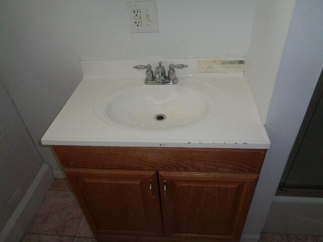 bathroom featuring vanity and tile patterned floors