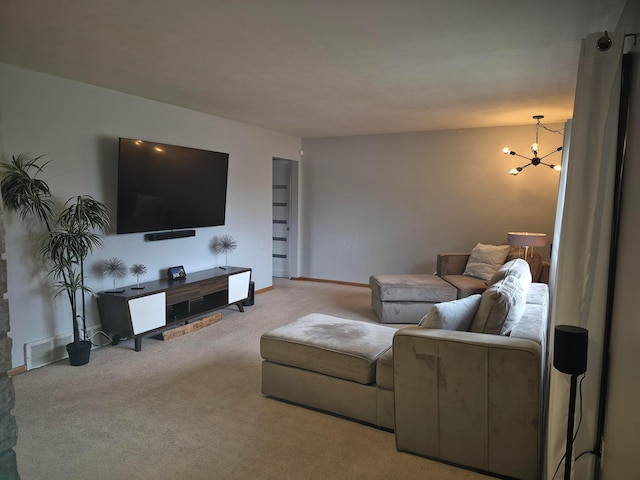 living room featuring carpet, a chandelier, and baseboards