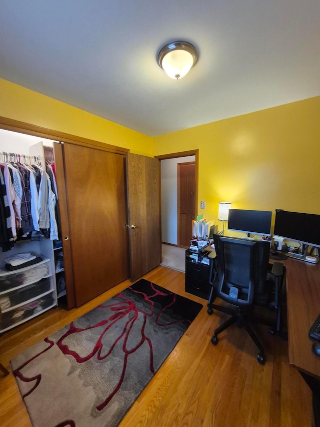 office area with wood finished floors