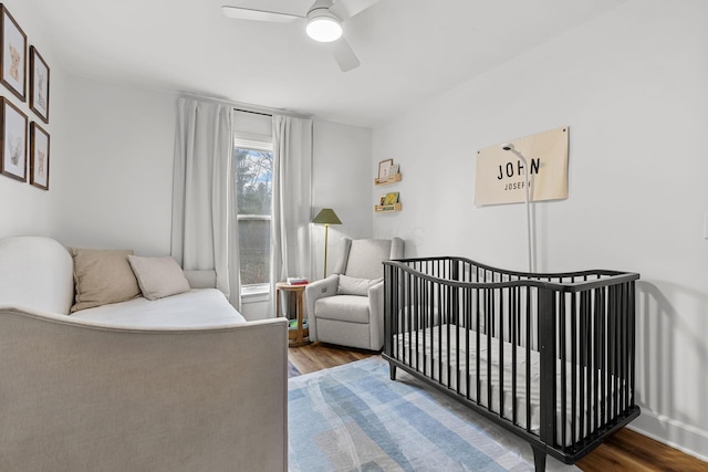 bedroom featuring ceiling fan and wood finished floors