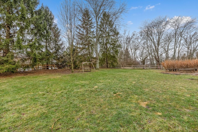 view of yard featuring fence