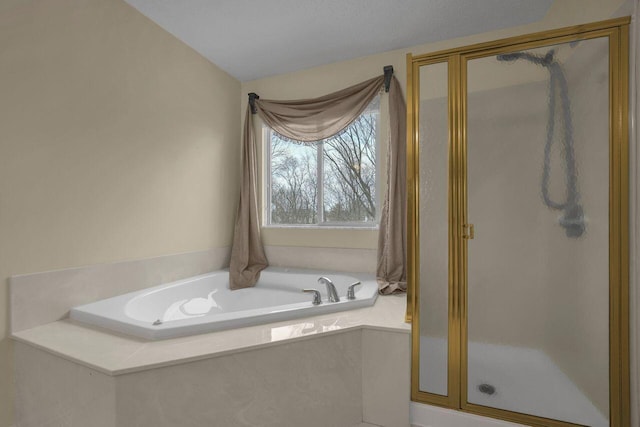 bathroom with separate shower and tub