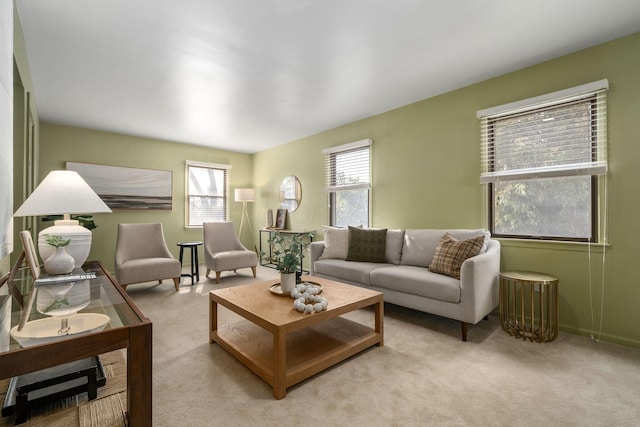 living room featuring light carpet