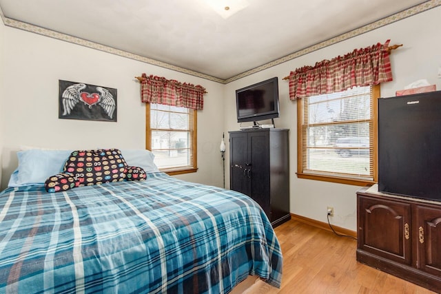 bedroom featuring light hardwood / wood-style floors