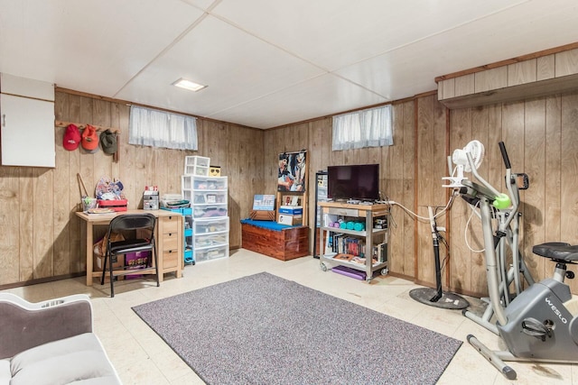 living room with wood walls