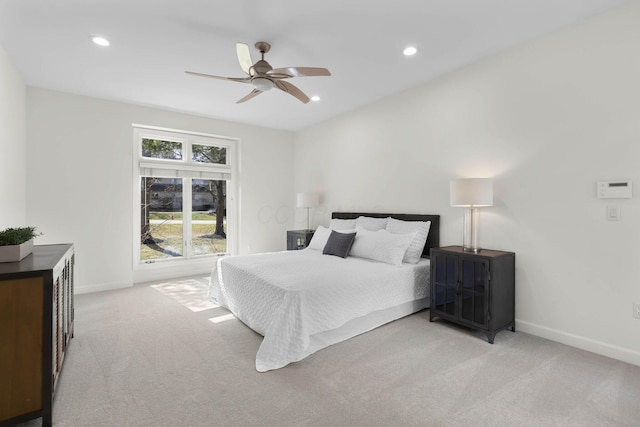 bedroom with a ceiling fan, recessed lighting, light colored carpet, and baseboards