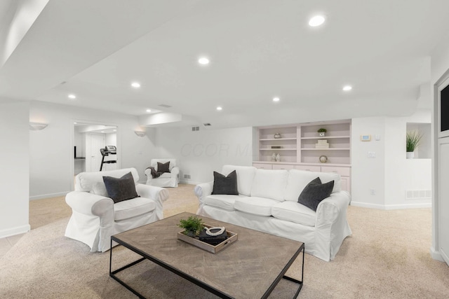 living room featuring visible vents, recessed lighting, light colored carpet, and baseboards