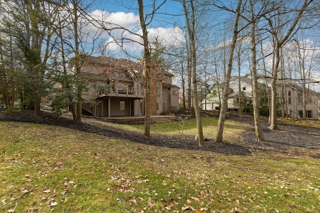 view of yard with a patio area and a wooden deck