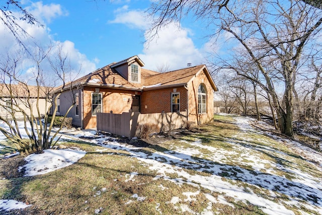 view of snow covered property