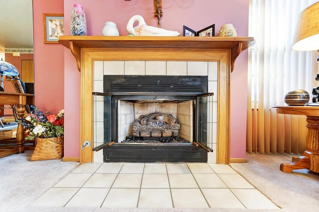 room details with a tile fireplace and carpet floors