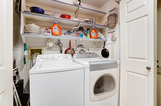 washroom featuring washing machine and dryer