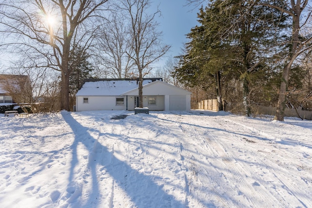 view of snow covered house