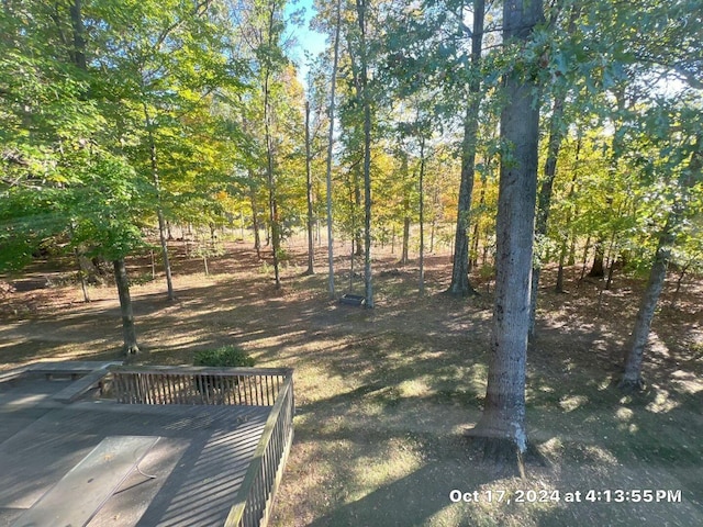 view of yard with a wooden deck