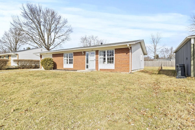 ranch-style house with a front lawn