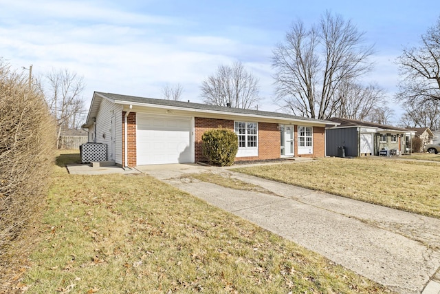 single story home with a garage and a front yard