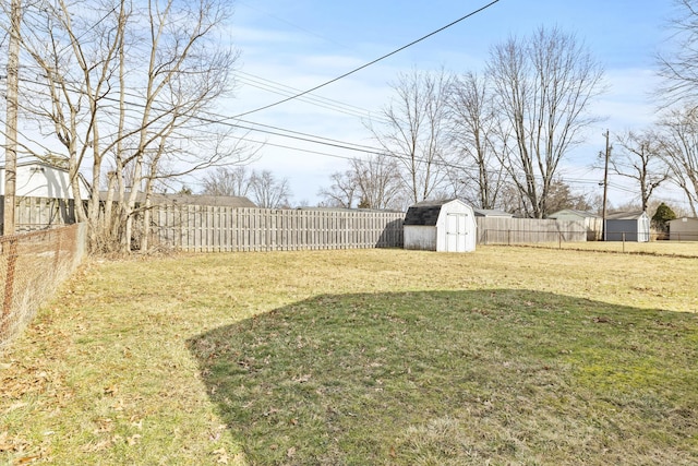 view of yard with a storage unit