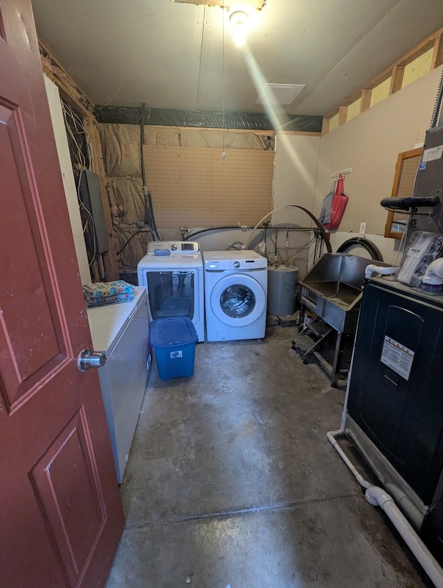 washroom with washer and clothes dryer