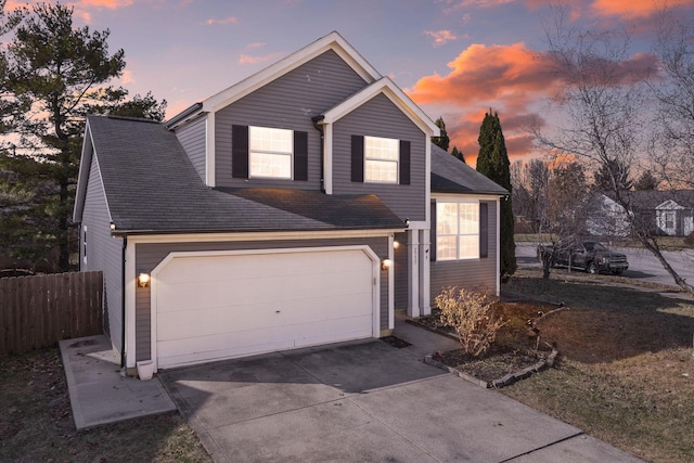 front of property featuring a garage