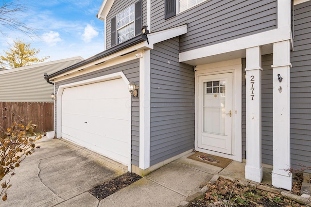 entrance to property with a garage