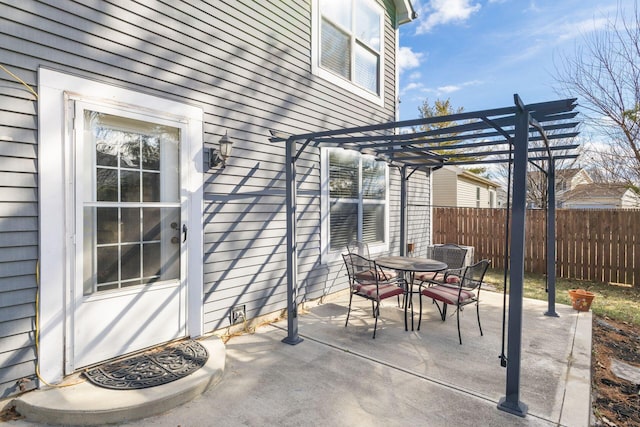 view of patio featuring a pergola