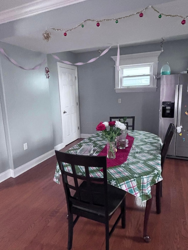 dining area with dark wood-type flooring