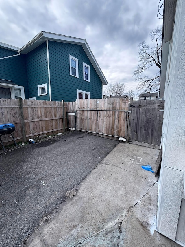 exterior space with a gate and fence