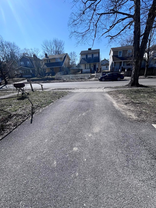 view of road with a residential view