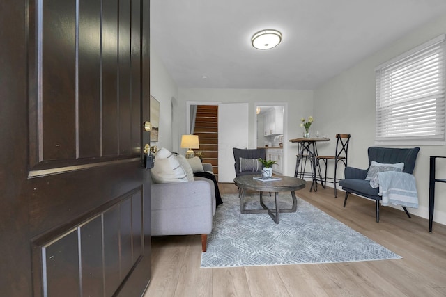 sitting room with light hardwood / wood-style floors