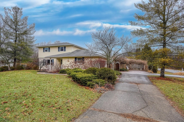 view of front of property with a front lawn