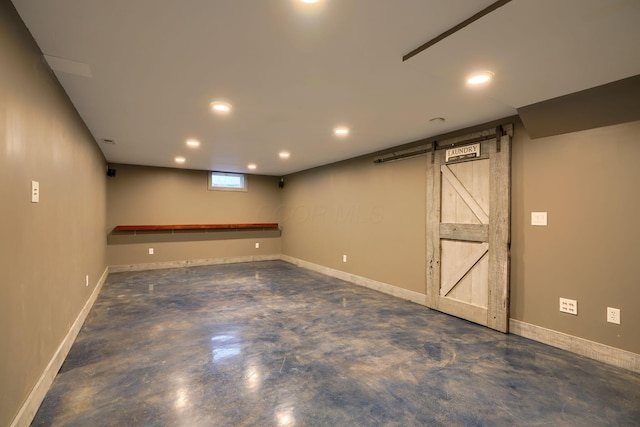 basement featuring a barn door