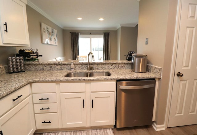 kitchen featuring sink, ornamental molding, dishwasher, light stone countertops, and white cabinets