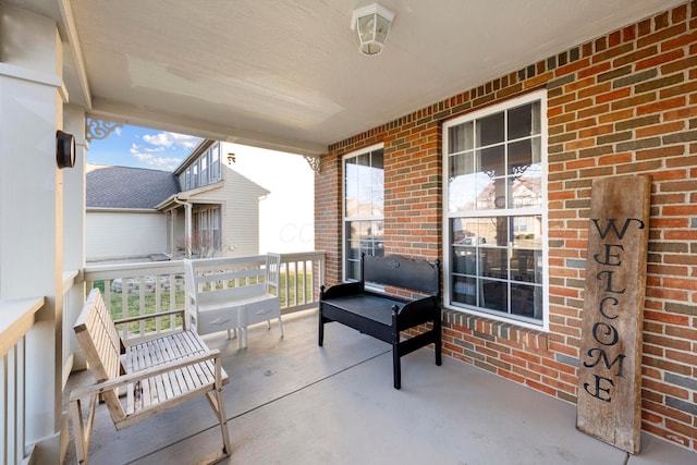 view of patio featuring a porch