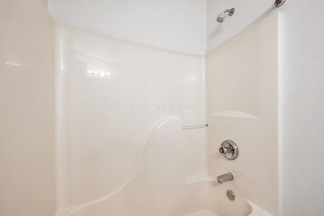 bathroom with shower / bathtub combination