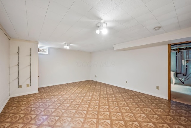 basement with light parquet floors