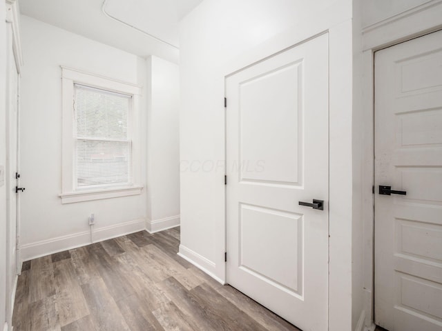 hallway featuring light hardwood / wood-style flooring