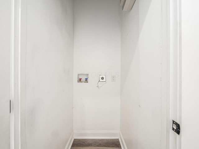 laundry room featuring washer hookup, wood-type flooring, and hookup for an electric dryer