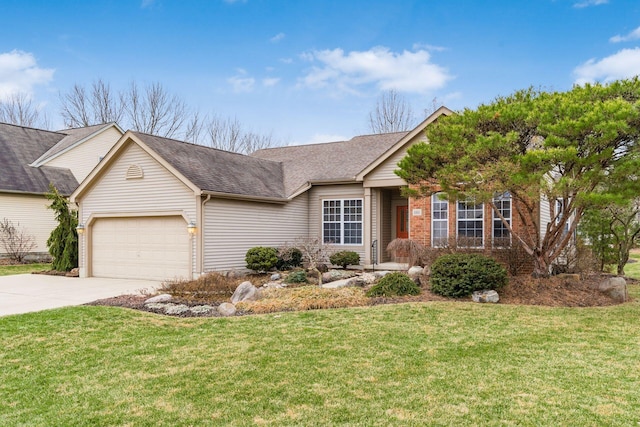 view of front of house with a garage and a front lawn