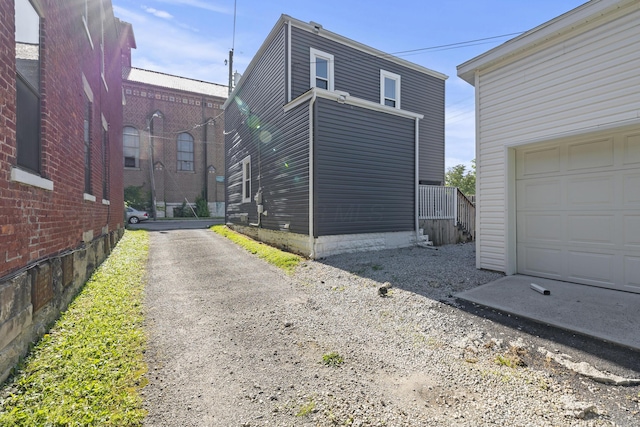 exterior space with a garage