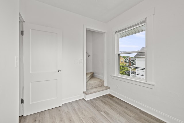 unfurnished bedroom with light hardwood / wood-style flooring