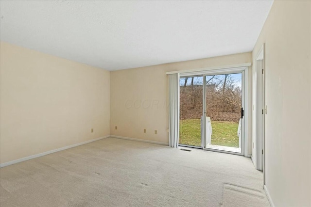 view of carpeted spare room