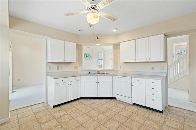 kitchen with white cabinets, sink, dishwasher, and ceiling fan