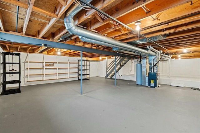 basement with heating unit and gas water heater