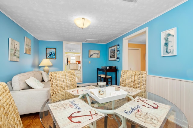 interior space with hardwood / wood-style flooring and a textured ceiling