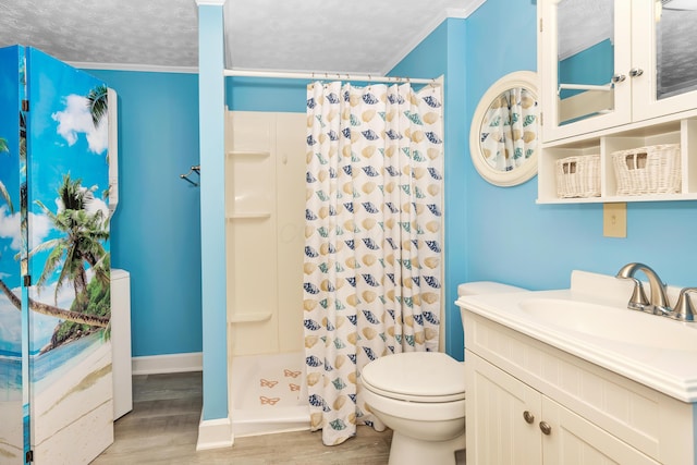 bathroom featuring wood-type flooring, vanity, toilet, a textured ceiling, and a shower with curtain