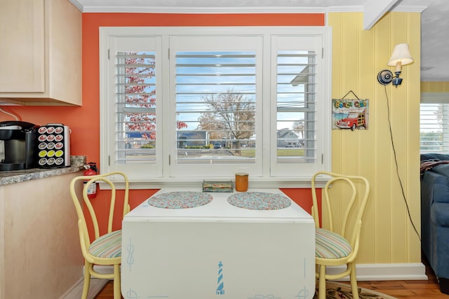 dining room with wood-type flooring